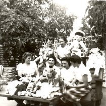 Women with Dolls and Stuffed Animals