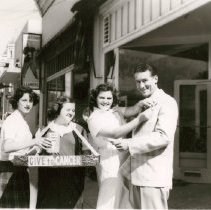 Rainbow Girls Sell Red Carnations for Fight Cancer Drive