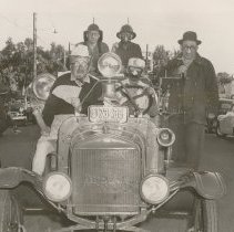 Goofy Firemen in Jalopy in Fair Parade