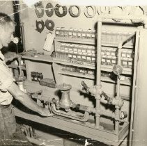 Roy Lowe at meter test bench
