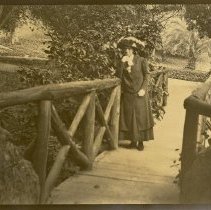 Woman on Bridge in Garden
