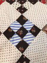 9 patch quilt top with squash blossoms