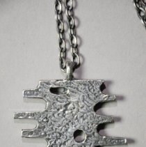 Close up of necklace pendant back view