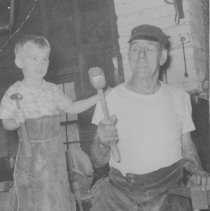 Harry Thomas, blacksmith, with Tad Ventres