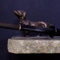 Fountain pen and its desk holder from Acorn Press.