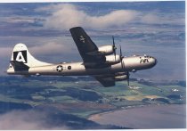 FIFI, B-29 Superfortress flying above Puget Sound in a test flight after re