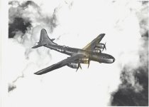 B-29 flying above the clouds