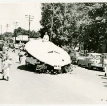 Spaceship parade float, "Mars X-1953", riding through town