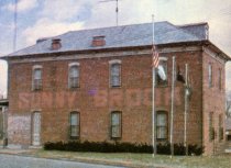 Sunny Brook Sign on Side of Exchange Club Building