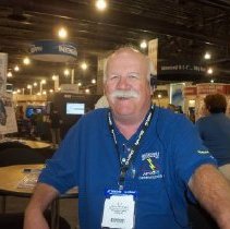 J.J. McFarland, APCO and historical committee member manning the booth.