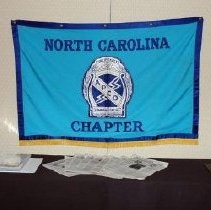 North Carolina Chapter Flag with APCO logo