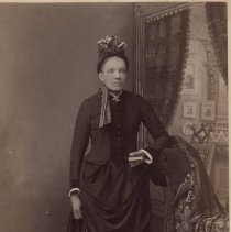 Unidentified woman in black dress, Cooper, c. 1880-1900