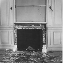 2.Fireplace in disrepair and broken glass