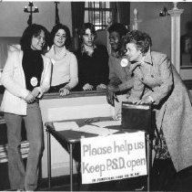 2.Chestnut Hill resident signs petition to save PSD as students watch