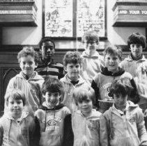 6.Ten Chestnut Hill Academy lower students, dressed in sweatshirts