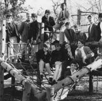 51.Fourteen unidentified students on playground equipment, c. 1990s