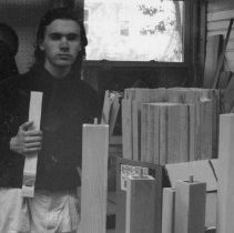 53.CHA student Eric Keebler with some of his handmade organ pipes