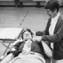 69.Chestnut Hill Academy nurse Eva Stehle with senior Hank Glodek