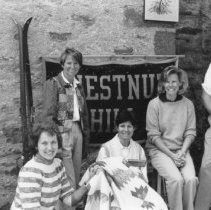 19.Looking at some of the merchandise to be sold at school's flea market