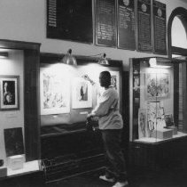 40.CHA evening staffperson William Macey prepares exhibit of his artwork