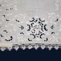 Placemat with cutwork, corner detail