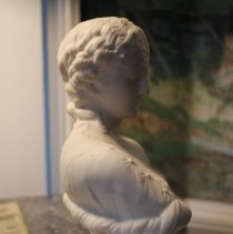 bust of woman from side