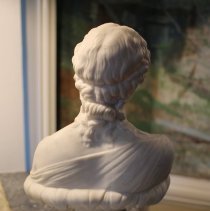 Bust of woman from back