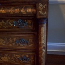 Chest, showing column at front, each side