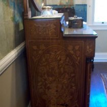 Chest from side showing floral imagery