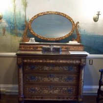 Marquetry chest with oval mirror