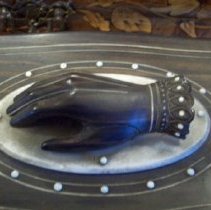 Glove box with hand cartouche