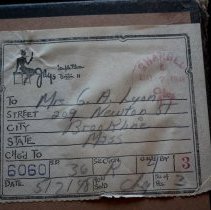 Delivery sticker on dress box