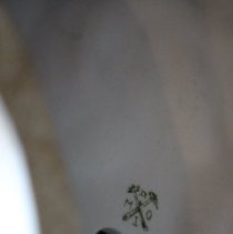 Duck figirurine, maker's mark