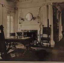 First floor Foyer and Hallway, looking north showing fireplace