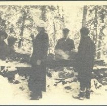 02.02 Group of people around a fire at Pecketts, 1914