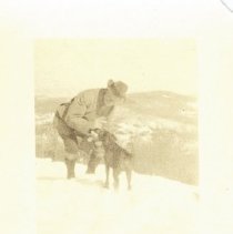 02.04 Pecketts, man with a dog, February 1922