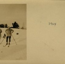 03.15 Pecketts, Marjorie and George Lyon on skiis, with a dog, 1924