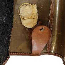 Monacle, bag, and holder