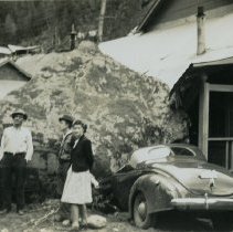 Large boulder that had crashed a car