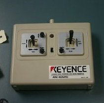 Transmitter and battery pack