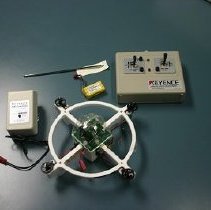 Transmitter, saucer, battery pack, and power supply