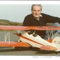 Dr. Harold Auerhan poses with the Great Lakes Trainer in 1989, photo provid