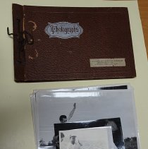 A2018.24.46-A2018.24.56 Photograph album and photographs