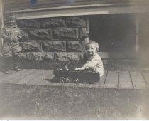 Two Children with Large Ride-On Locomotive