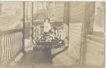 Travis McClure on Porch with Windup Train