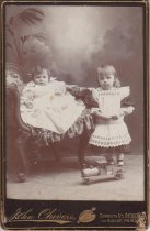 Two Children w. Wooden Floor Train in Foreground