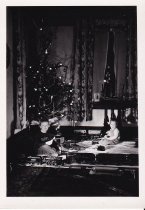 Two Boys Sit Under Christmas Tree with Standard Gauge Trains