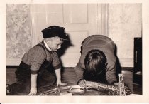 Two Boys with a Train Set