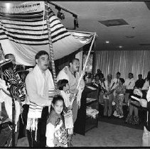 Rabbi Arnold Kopikis leads congregants to their in Mission Valley site 1993