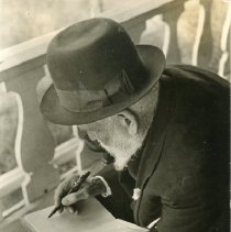 Oscar Laighton Signing A Book